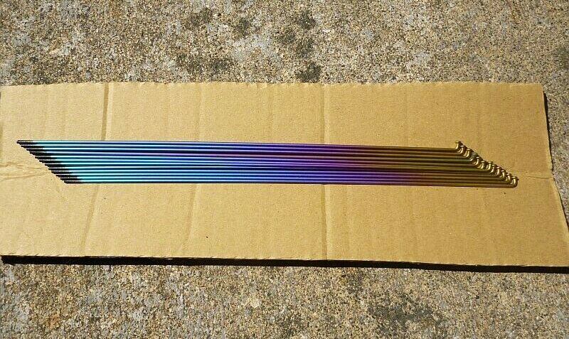 Lot of 12 New Titanium 14G Spokes Rainbow 266mm