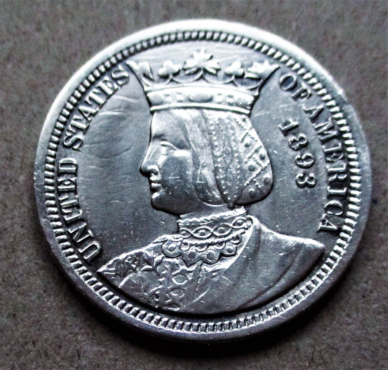 1893 Isabella Silver Quarter, Raw, Circulated And Uncertified.
